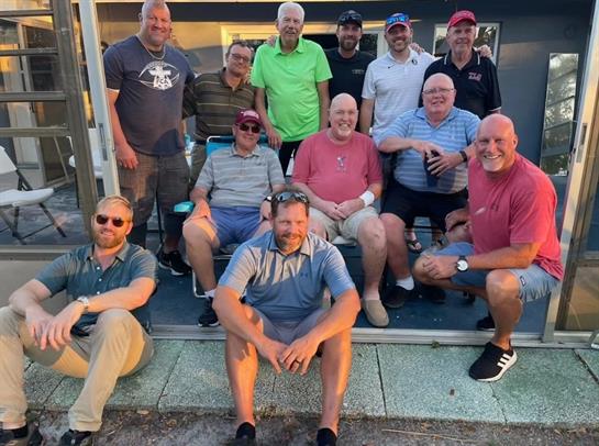 Friends enjoy a relaxed outdoor evening filled with laughter and stories.