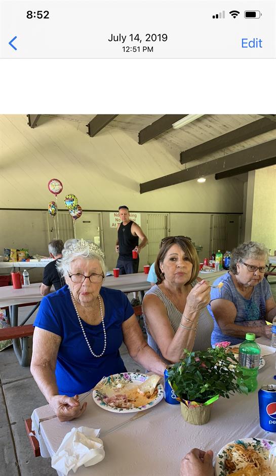 A group of women sitting at a table