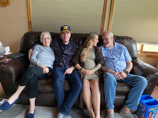 A group of people sitting on a couch