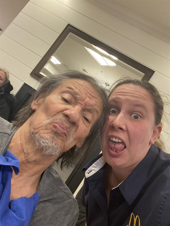 A man and woman making silly faces