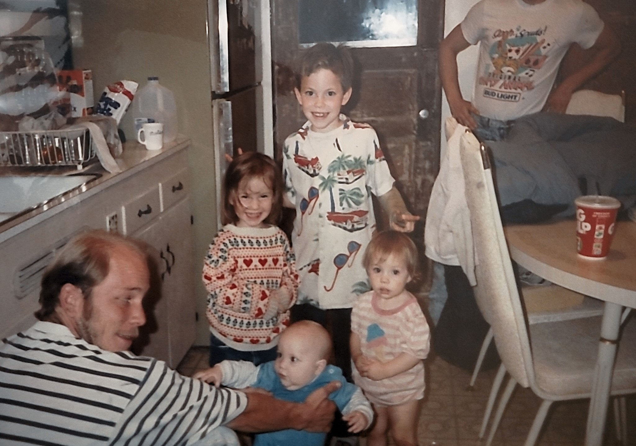 A group of children and a man