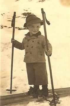 A child holding ski poles