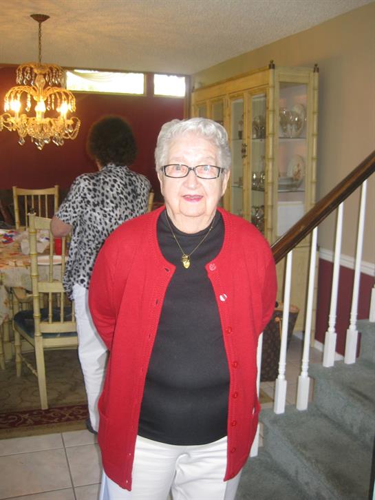 A woman in a red sweater
