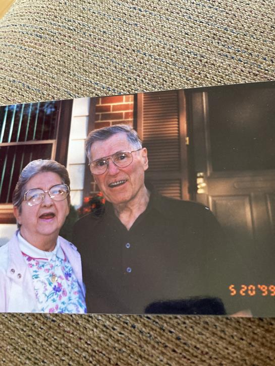 A man and woman posing for a picture