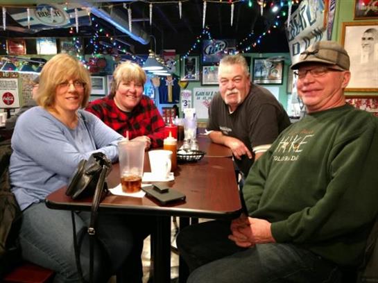 A group of people sitting at a table