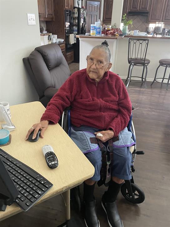 An old woman in a wheelchair