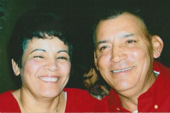 A man and woman smiling for a photo