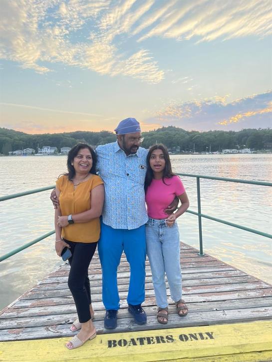 A group of people standing on a dock