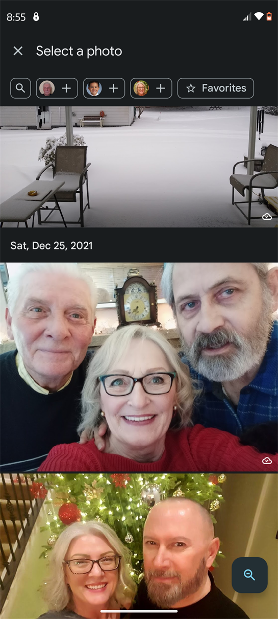 Three friends capture a joyful moment together in a warm indoor space on Christmas Day.