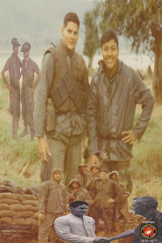 Two soldiers smile for a portrait among fellow troops in a green setting during daytime.