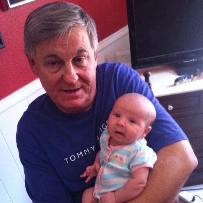 A man holding a baby