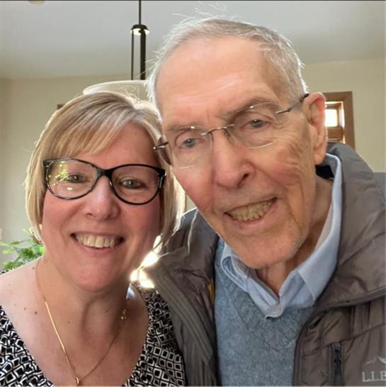 A man and woman taking a selfie