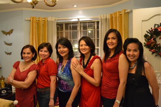 A group of women posing for a photo