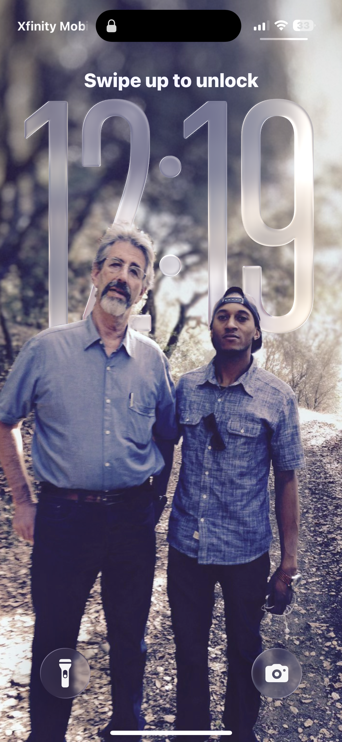 Two men standing on a path