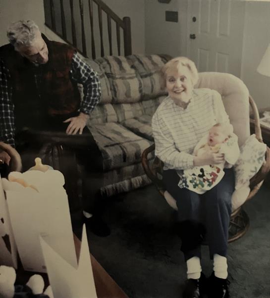 A man and woman sitting on a couch