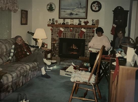 A group of people sitting in a living room