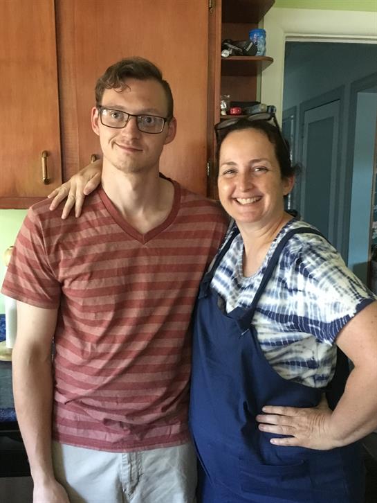 A man and woman posing for a picture