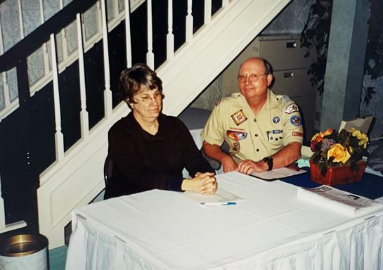 A man and woman sitting at a table