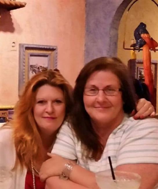 Two women posing for a picture