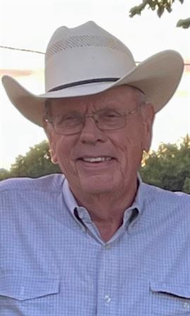 A man wearing a cowboy hat