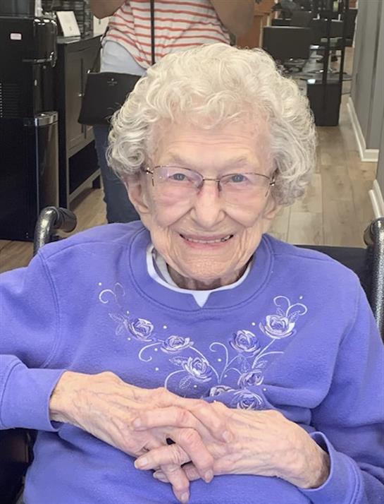 An old woman in a wheelchair