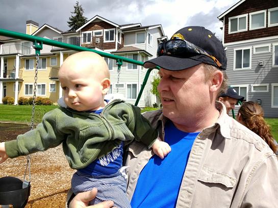 A man holding a baby