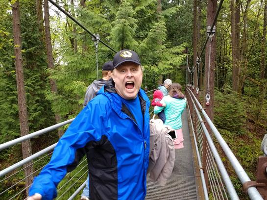 A man standing on a bridge