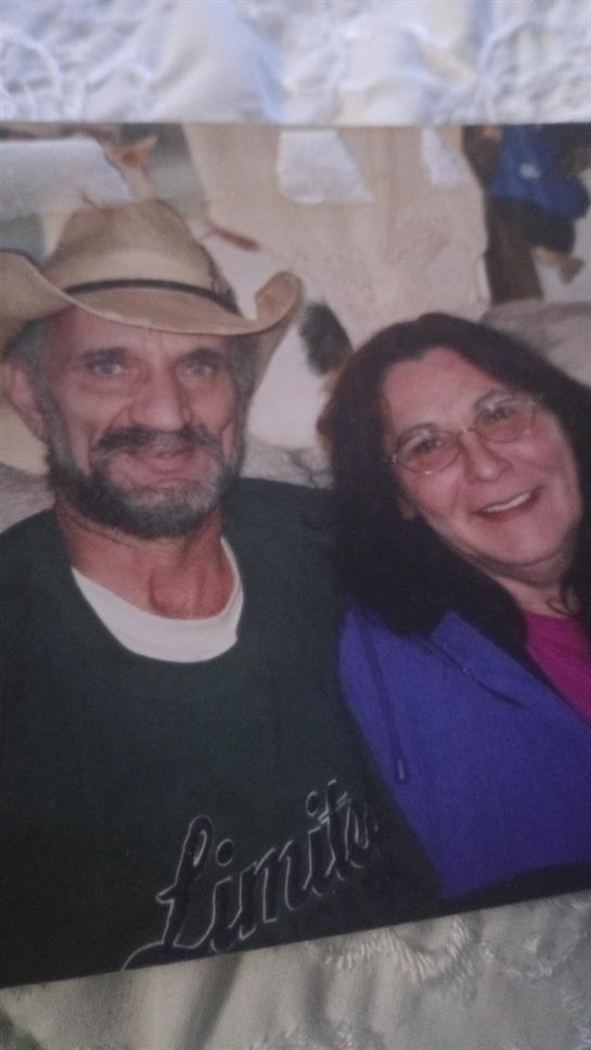 A man and woman smiling for a picture