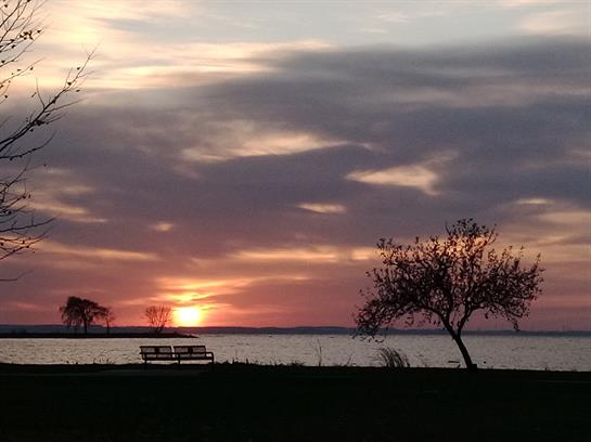 A sunset over a lake
