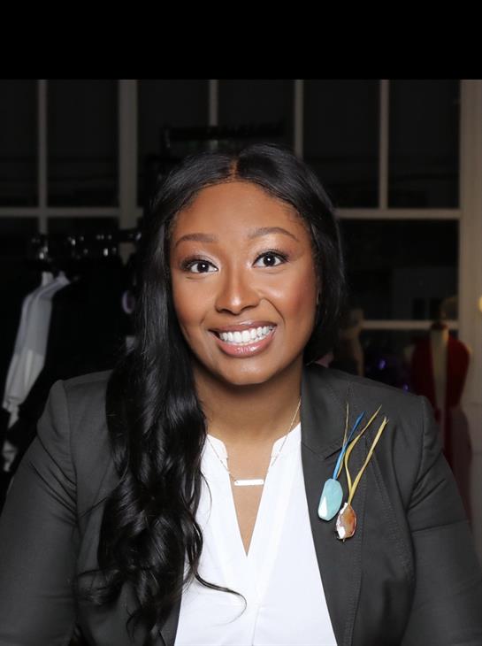 A woman smiling at camera