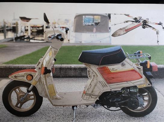 A motorcycle parked on the side of a road
