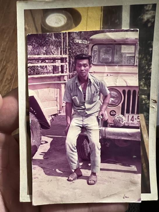 A man posing for a picture