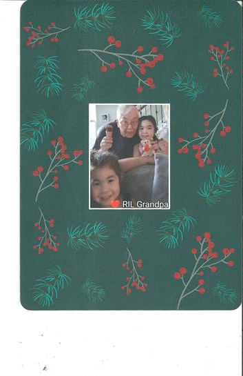 Family members enjoy a happy gathering in a living room filled with festive decorations and warmth.