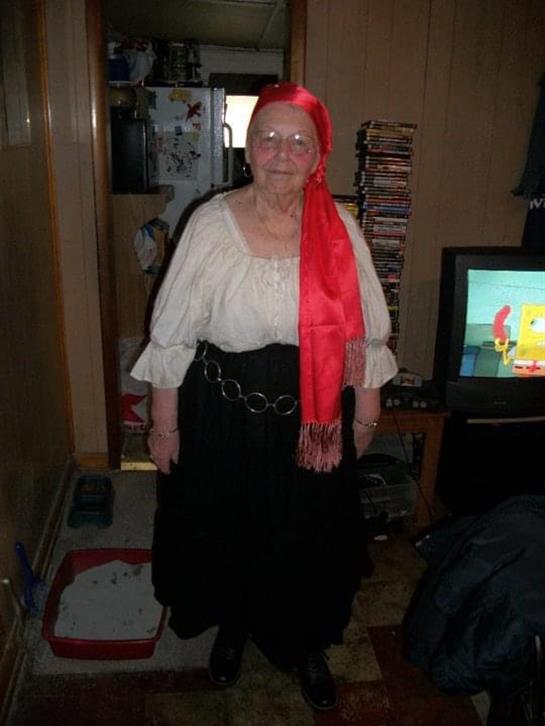 A woman wearing a red scarf