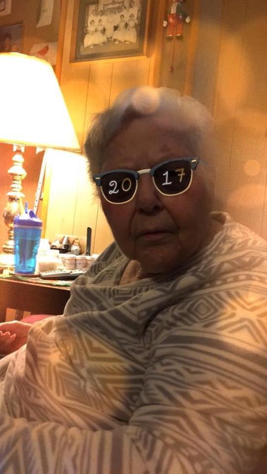 A woman wearing sunglasses with numbers on them