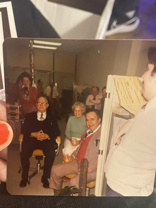 A group of people sitting in chairs