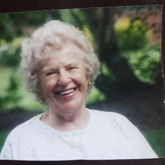 A woman smiling at the camera