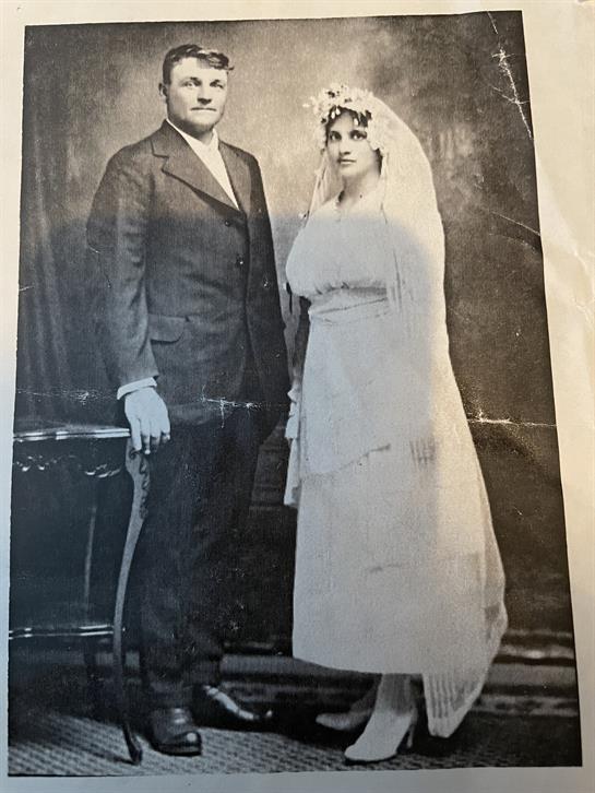 A man and woman in wedding attire