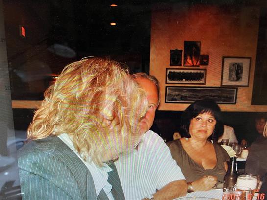 A group of people sitting at a table