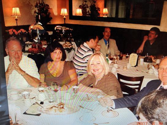 A group of people sitting at a table