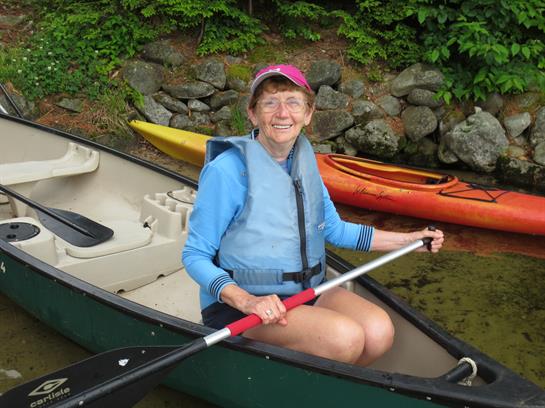 A woman in a canoe