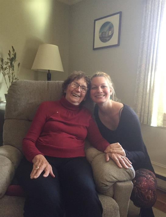 Two women sitting in a chair
