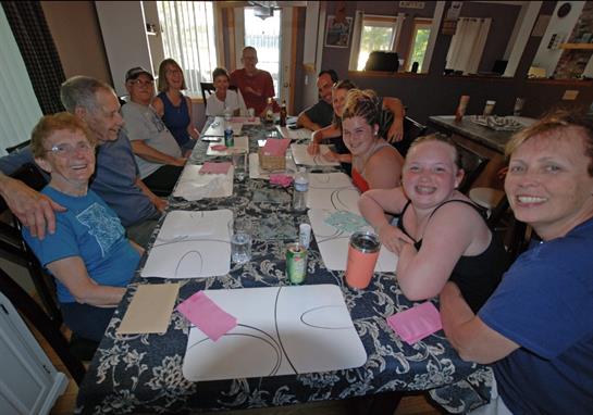 A group of people sitting at a table