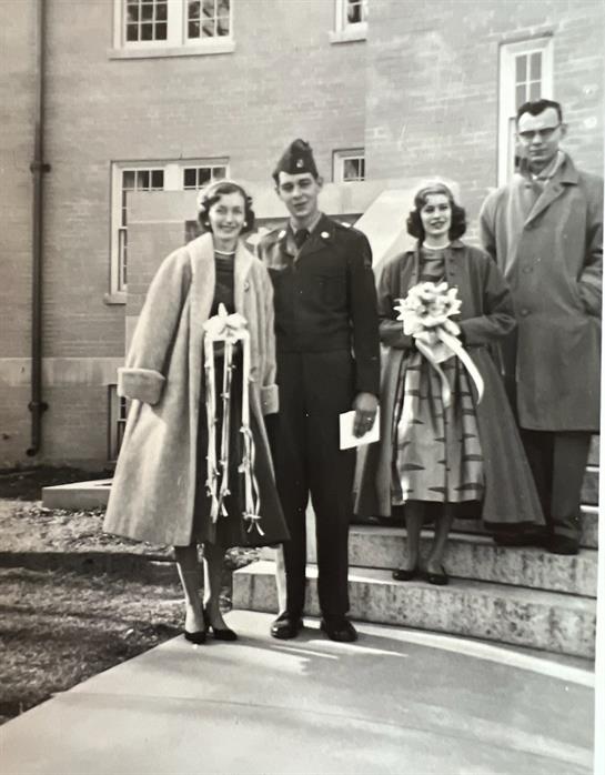 A group of people posing for a photo
