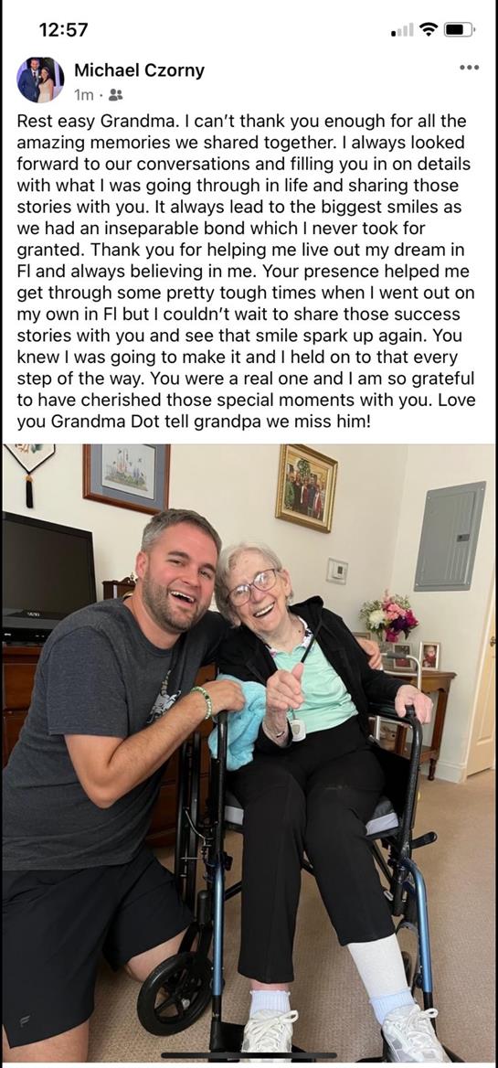 A man and woman in a wheelchair