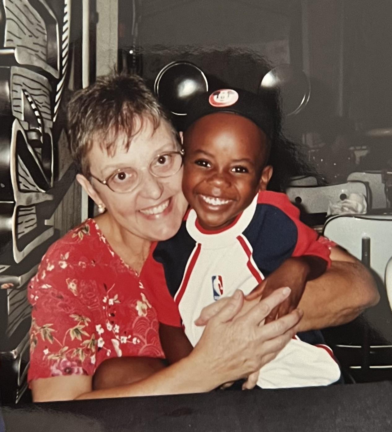 A woman holding a child