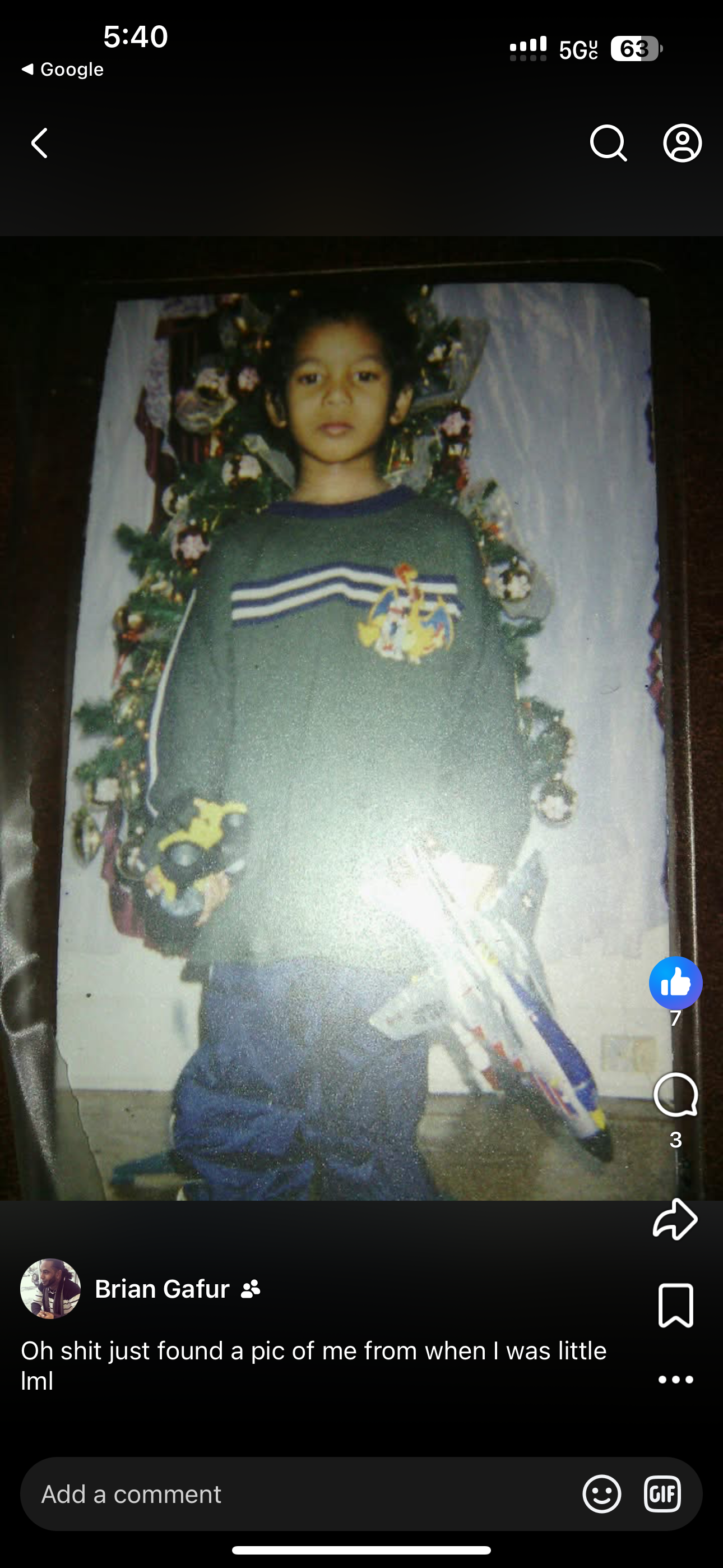 A boy holding a toy airplane