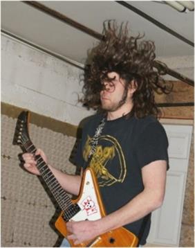 A man playing a guitar