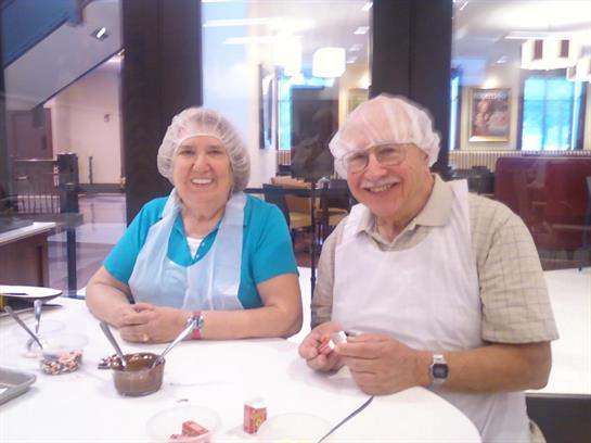 A man and woman sitting at a table