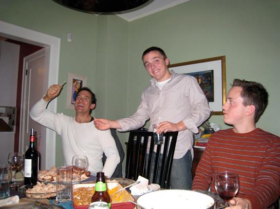 A group of men sitting around a table